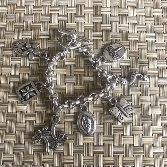 Cute Little Charm Bracelet with 7 charms including flowers , ladybug, butterfly - Picture 6 of 7